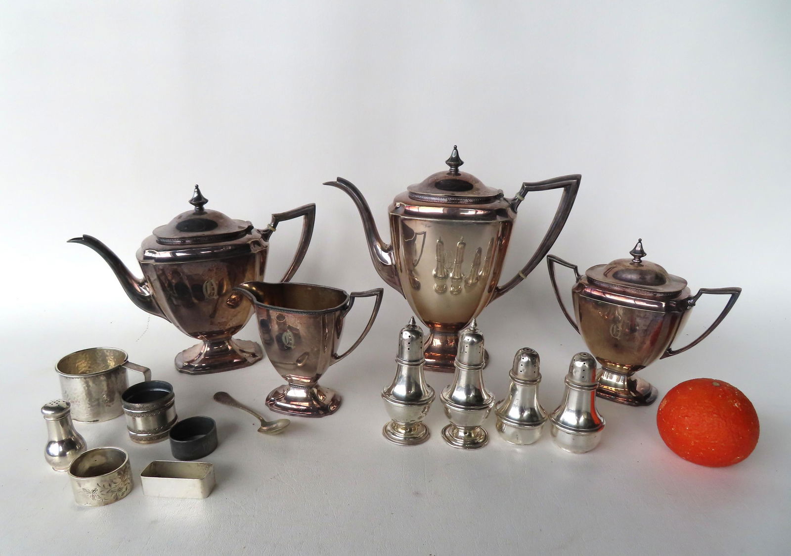 Grouping of Sterling silver and a 4 piece silver plate tea service marked "Pairpoint / Sheffield / (1 of 6)