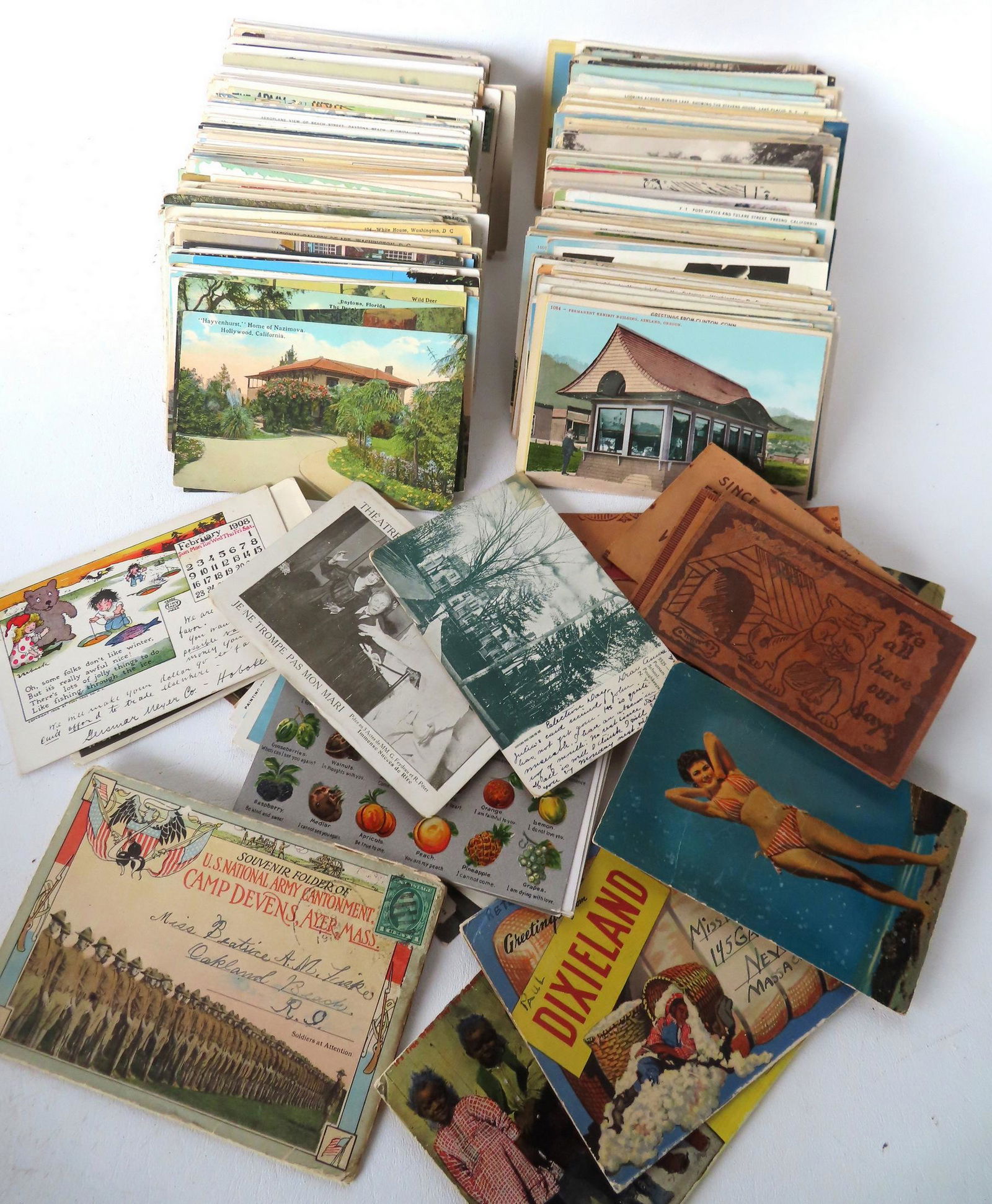 Over 600 loose postcards including holidays, locations, whimsical, photos, 2 squeakers of ladies in (1 of 12)