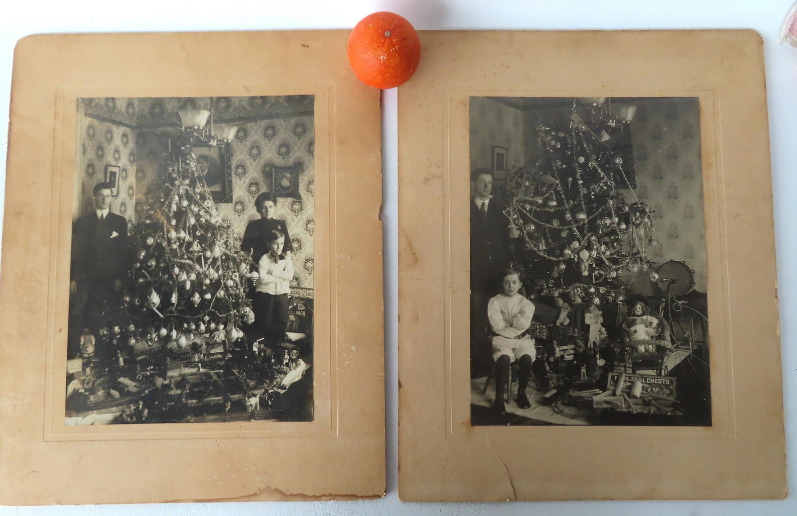 Two large black and white photos of an Edwardian era family posing in front of Christmas tree with (1 of 4)