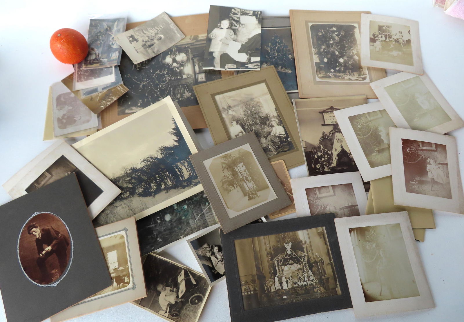 Grouping of mostly Christmas photos and some Christmas postcards including photo postcards. Includes (1 of 12)