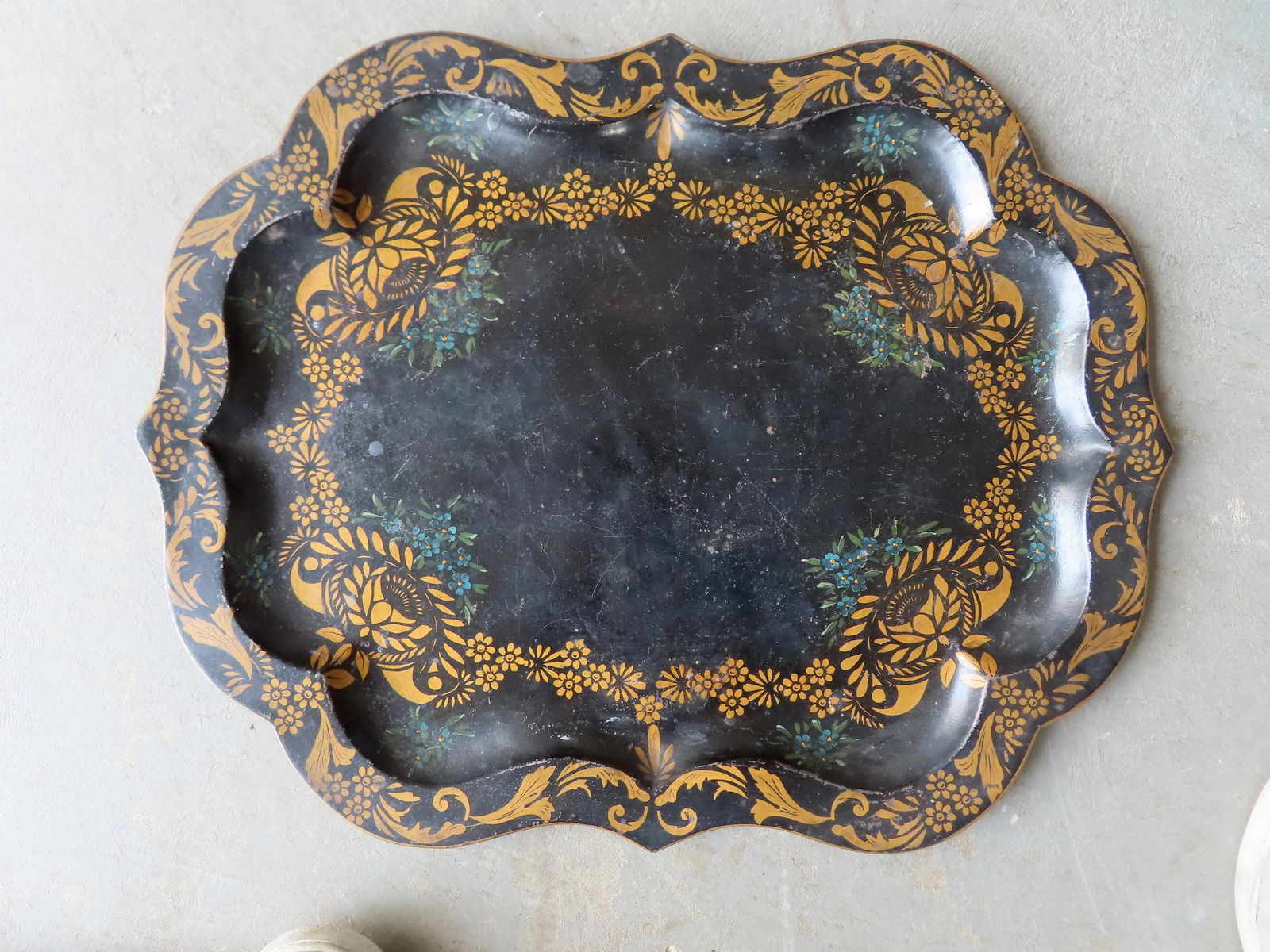 A 19th century stenciled toleware tray with scalloped edge. (1 of 5)