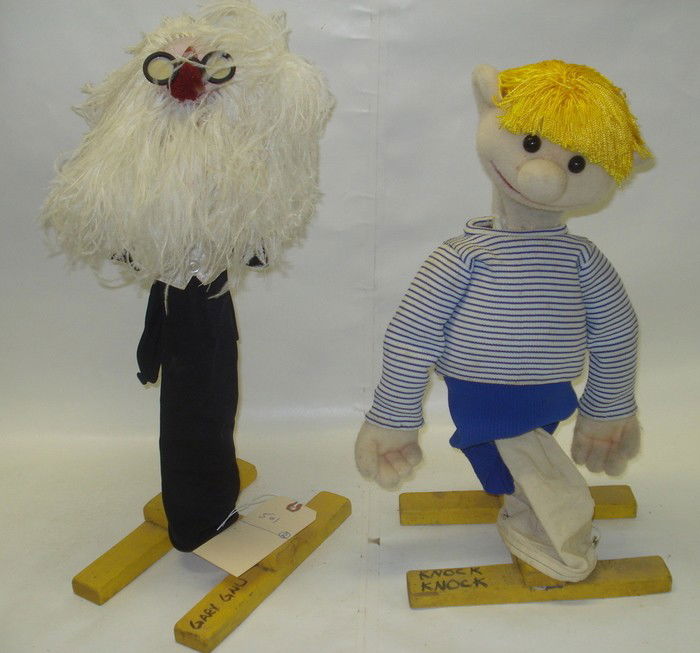 Two hand puppet/muppets including musical conducto: Two hand puppet/muppets including musical conductor and little boy with blond hair.