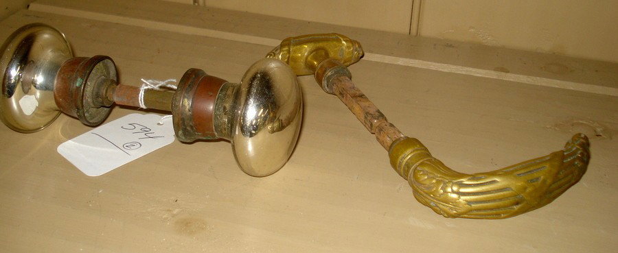 Pair of mercury glass door knobs together with an: Pair of mercury glass door knobs together with an ornate brass door handle.