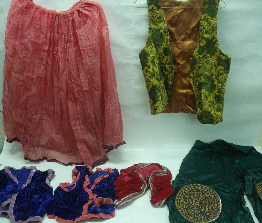 Box of misc theatrical costumes.: Box of misc theatrical costumes including 2 velvet vests. From the estate of Kermit Love, costume designer and puppet maker (NY 1916-1928)