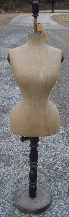 Late 19th century dress form.: Late 19th century dress form with fitted top, hat finial on turned wooden adjustable base.