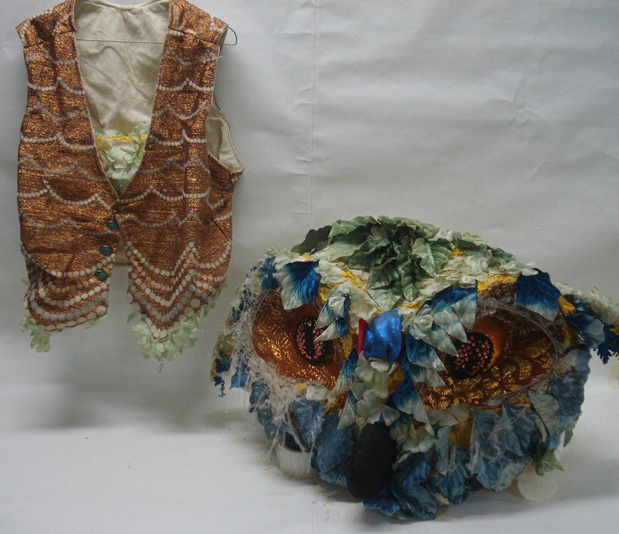 Theatrical costume - Owl's head & vest.: Theatrical costume consisting of owl's head and vest, probably made by Kermit Love. Head measures approximately 16" x 24". From the estate of Kermit Love, costume designer and puppet maker (NY 1916-19