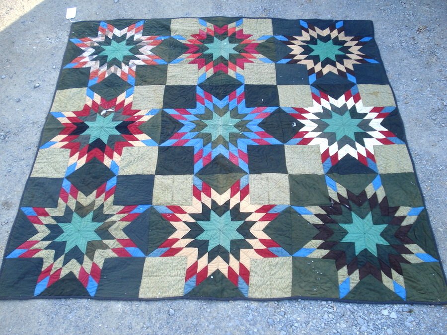 Star pattern Amish quilt - some moth damage.: Star pattern Amish quilt - some moth damage.