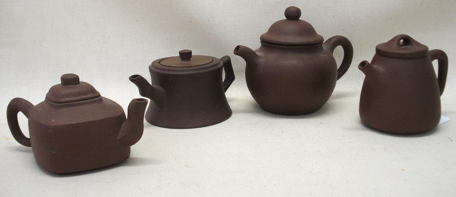 Four Yixing clay teapots - 3"H to 4.5"H. All signe: Four Yixing clay teapots - 3"H to 4.5"H. All signed, good quality, probably 20th century.