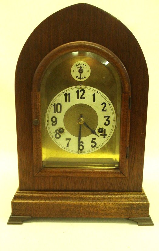 German mantel clock with Westminster chimes - Goth: German mantel clock with Westminster chimes - Gothic mahogany case - 14.5"H.