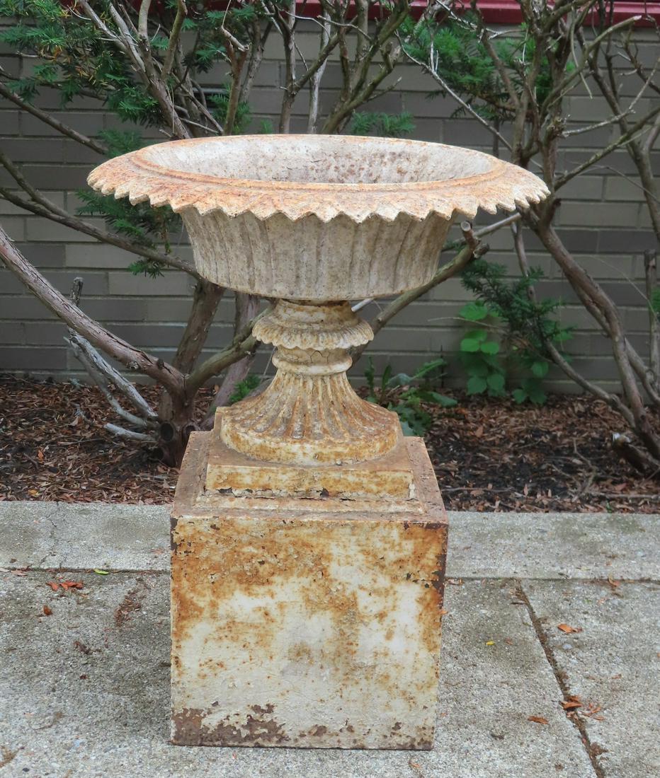 A Cast iron 2 part garden urn, 19th century. Small hairline on top corner of plinth, else, good (1 of 6)