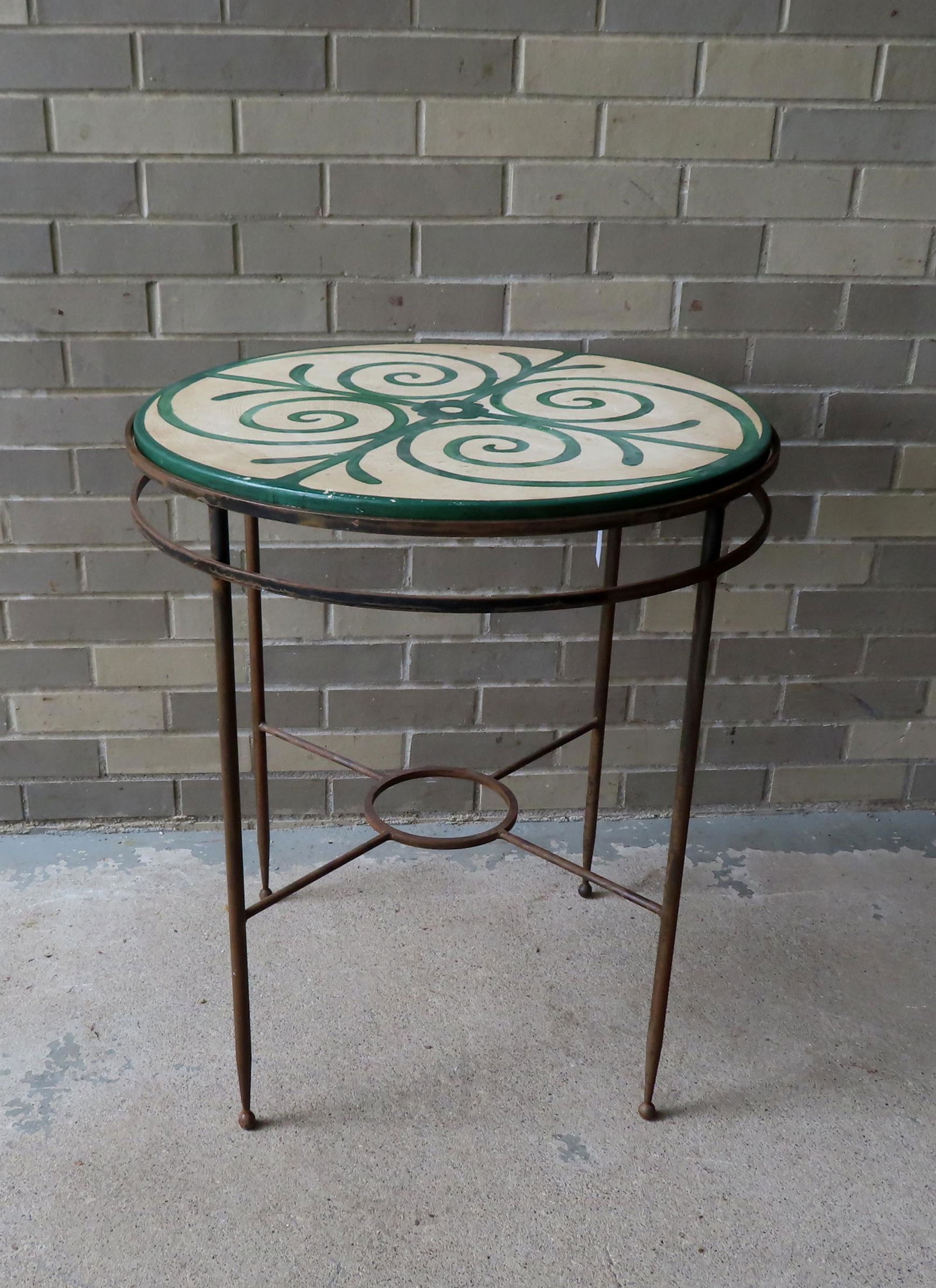 A cast iron round patio table with a hand painted wooden top in original green and white paint - (1 of 3)