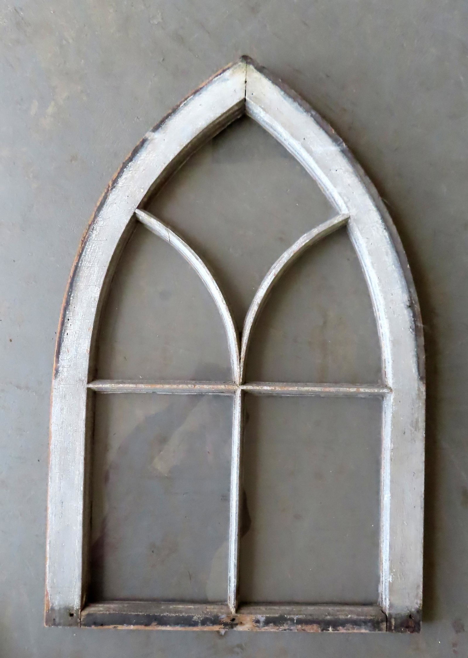 A gothic arched window, mid to late 19th century, very good condition. Measures 20 1/2"W x 31 1/2"H: A gothic arched window, mid to late 19th century, very good condition. Measures 20 1/2"W x 31 1/2"H x 1 1/4" thick.