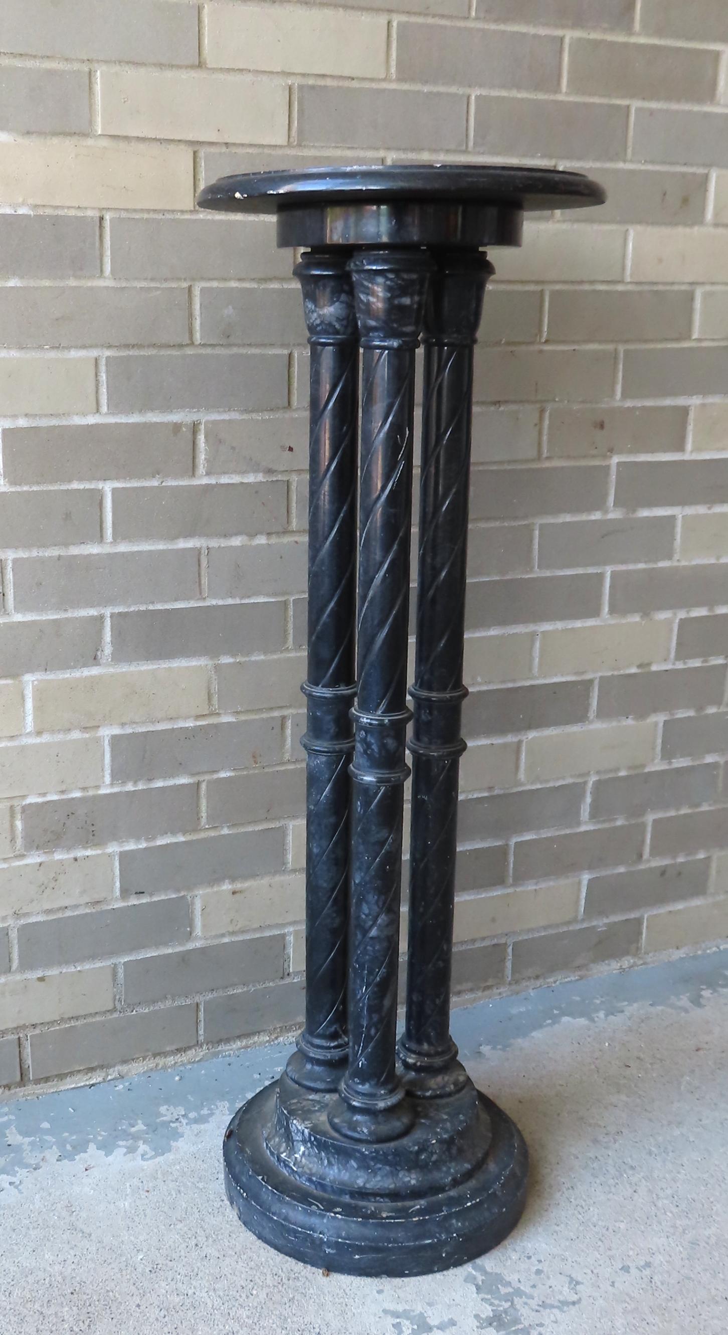 A black marble pedestal with 3 turned columns attached to a stepped round base, late 19th to early (1 of 7)