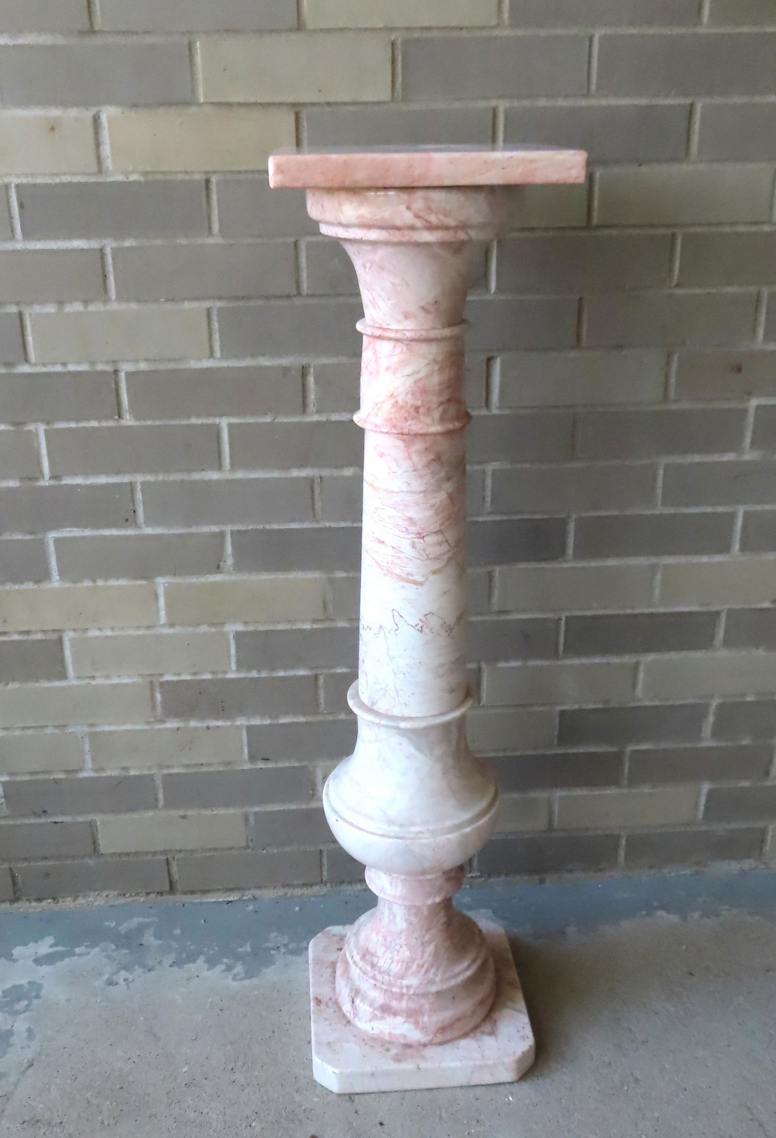 A pink, white & gray marble pedestal having a square top which attaches to a turned column mounted (1 of 6)