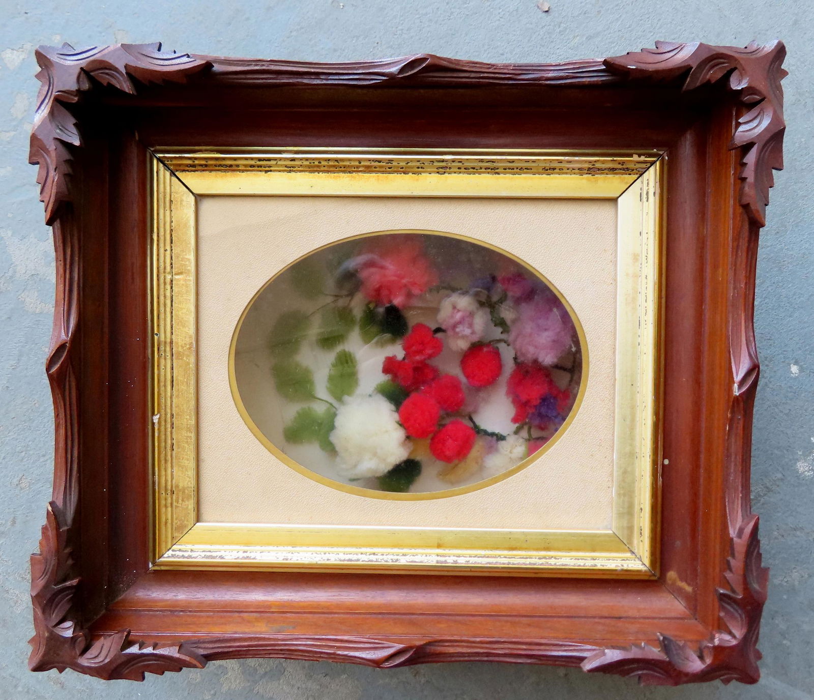 A diorama depicting colorful puffy flowers housed in it's original black walnut frame, circa 1875.: A diorama depicting colorful puffy flowers housed in it's original black walnut frame, circa 1875. Very good condition. Total frame size 13 1/2" x 15 1/4".