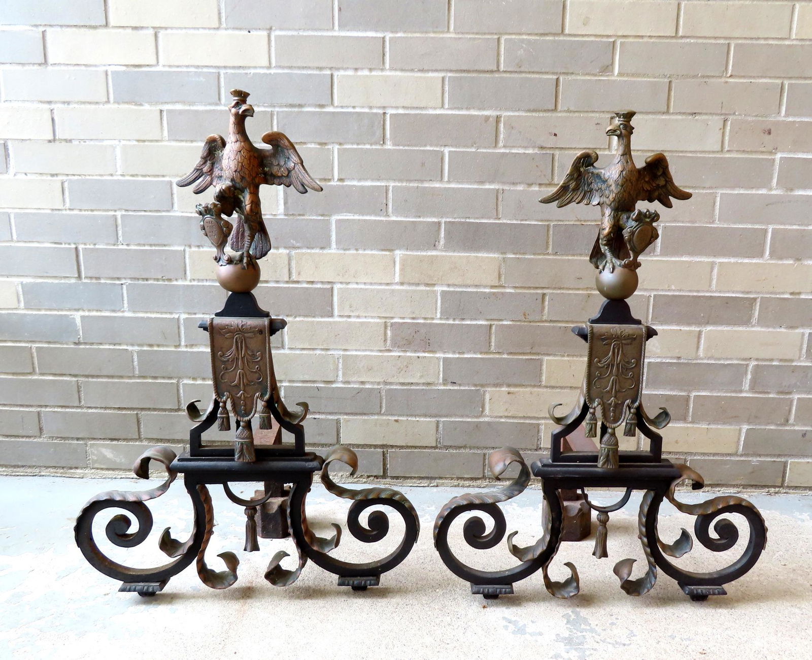 A majestic pair of neoclassical brass and iron andirons having a finial of a spread wing eagle (1 of 9)