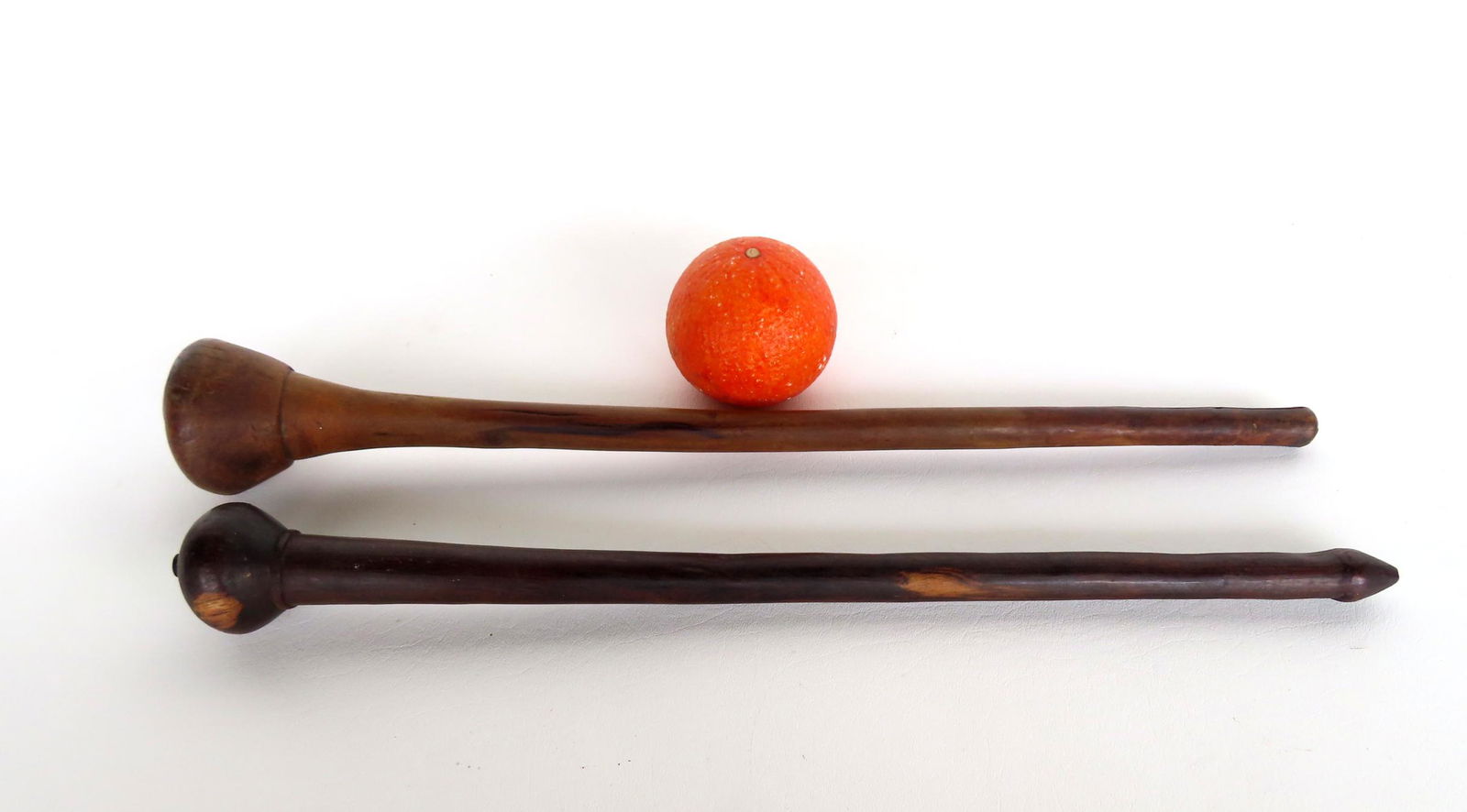 Two primitive wooden beaters, both in good condition, 18th to early 19th century.  Either indigenous (1 of 5)