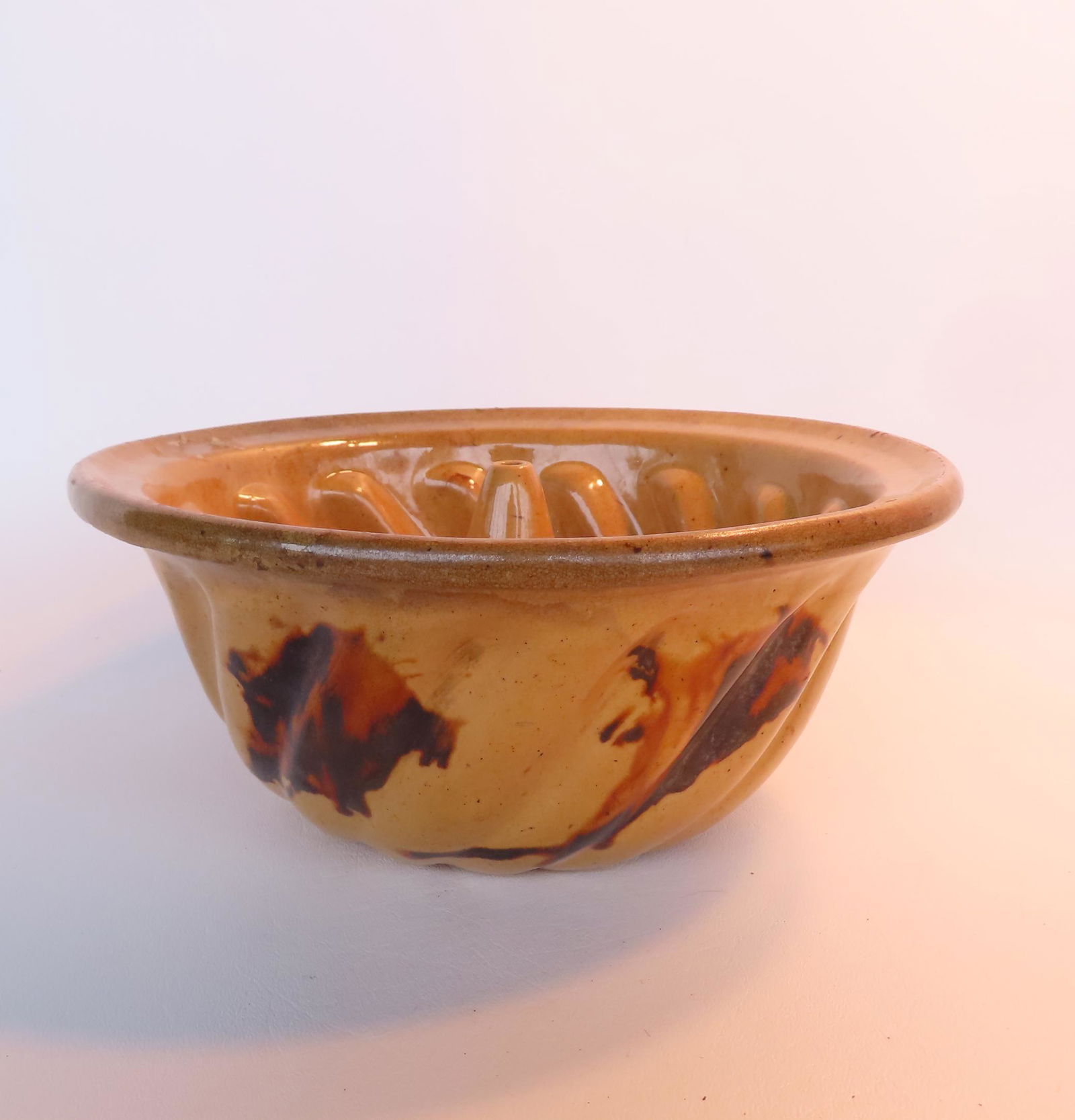 An unusual yellowware cake mold with large manganese splotches, mid 19th century - very good (1 of 8)