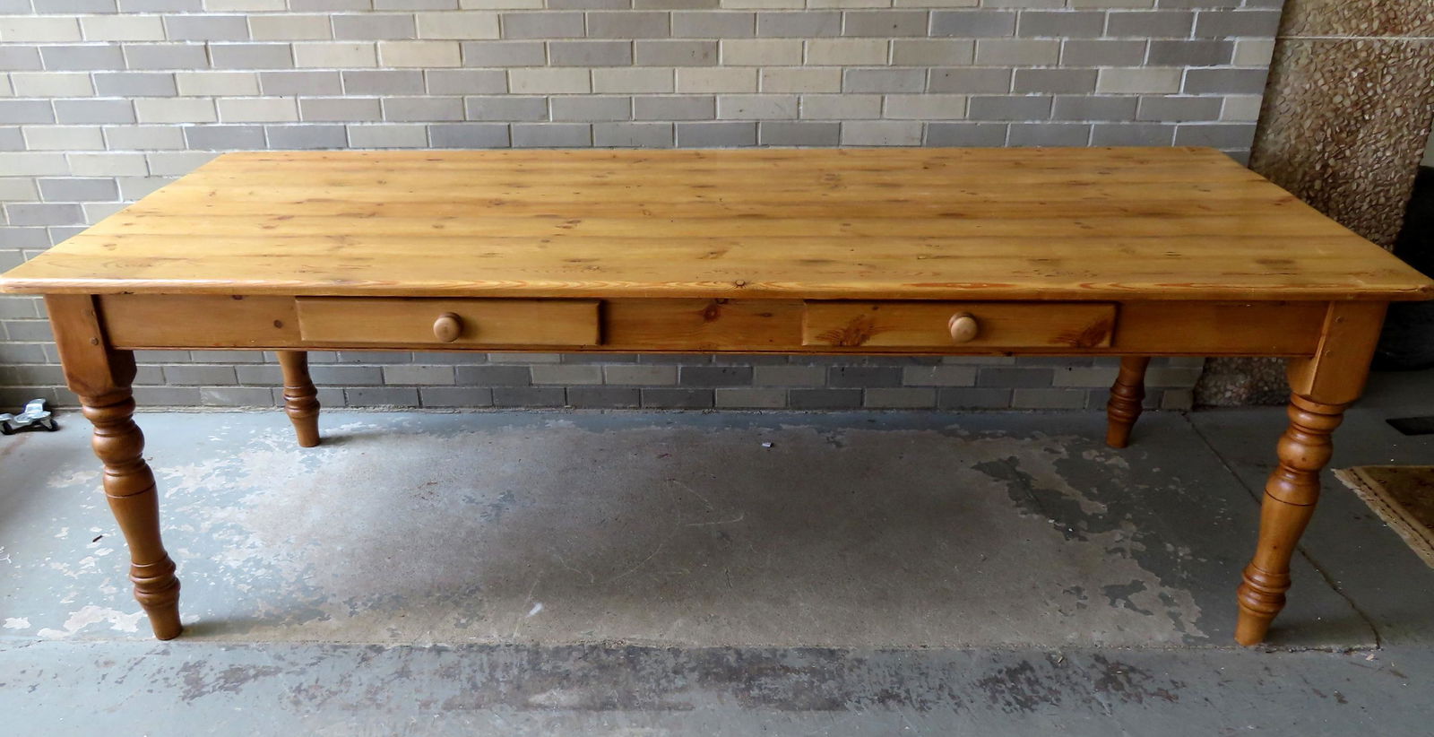 A large custom made English scrubbed pine farm table with heavy turned legs, and 2 dovetailed side (1 of 8)