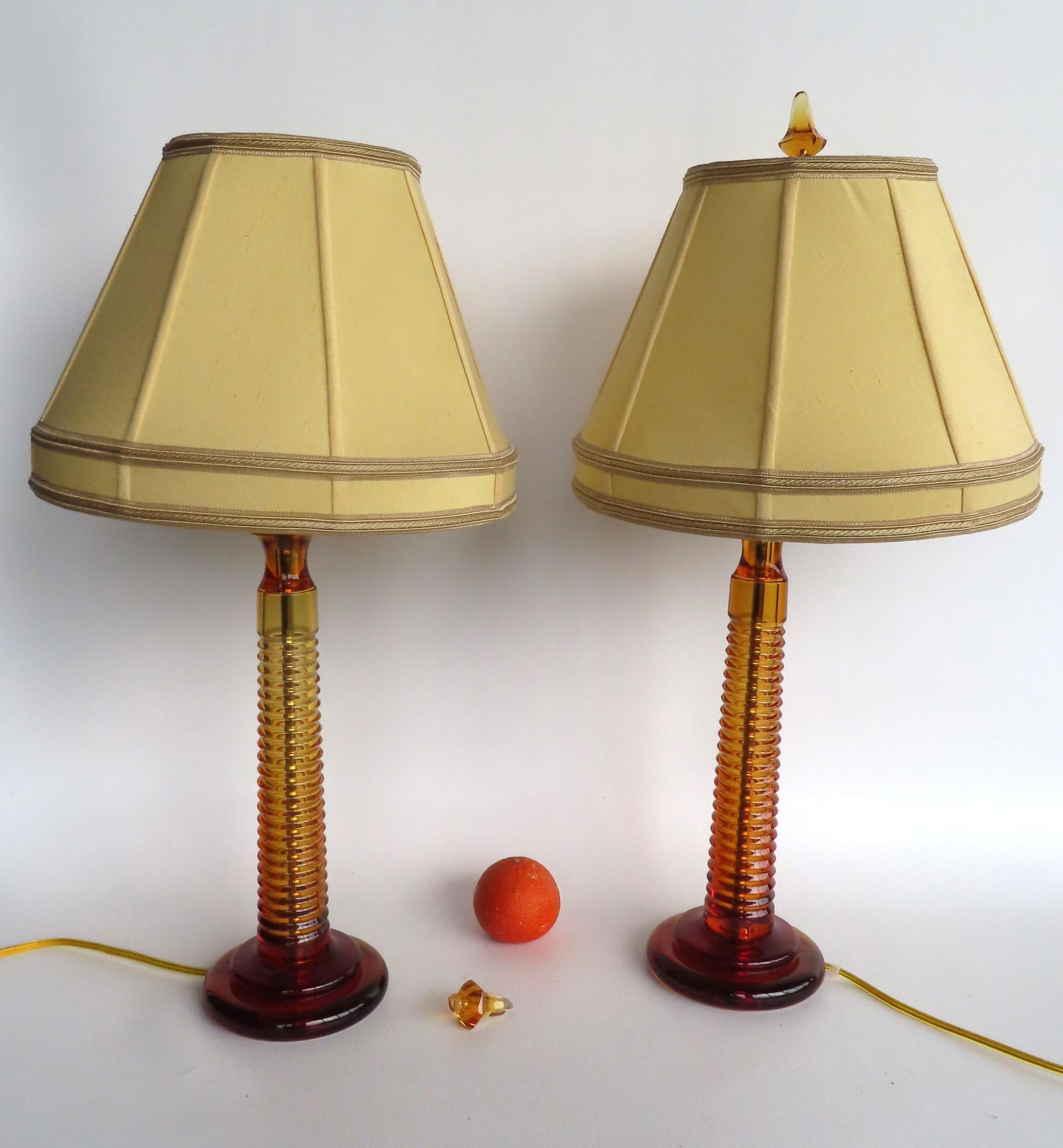 Two mid-century modern style table lamps in amber glass and cloth shades - one lamp with broken (1 of 11)