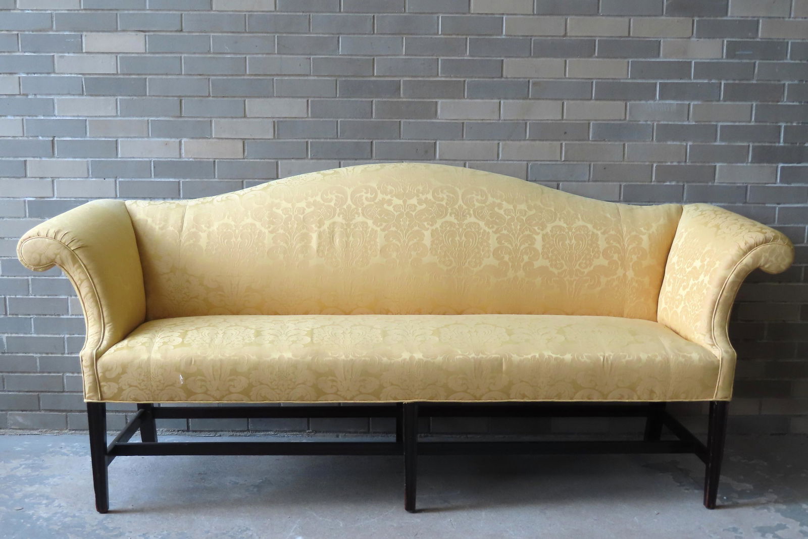 A beautiful Chippendale style camel-back sofa tastefully upholstered in a very fine gold silk (1 of 11)