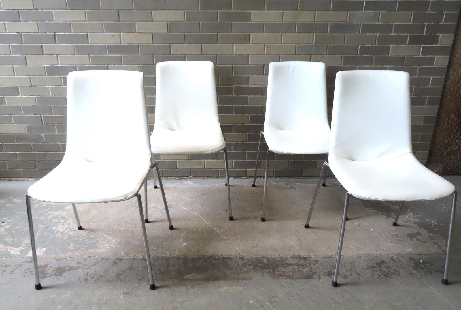Set of 4 leather De Sede DS -717 Dining chairs, designed by Claudio Bellini. Original De Sede label: Set of 4 leather De Sede DS -717 Dining chairs, designed by Claudio Bellini. Original De Sede label and marked "Made in Switzerland". They are all in very good condition and sell from retail store at