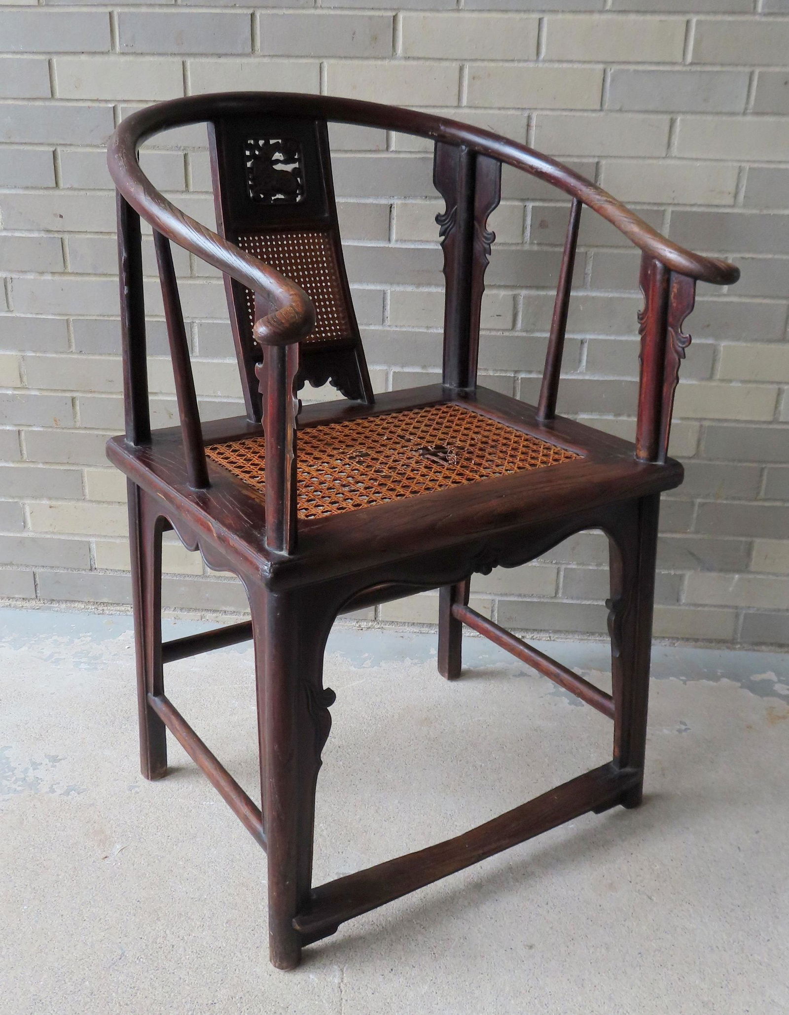 A Chinese horseshoe-back chair having a back splat with a pierced carved water buffalo and flowers (1 of 14)