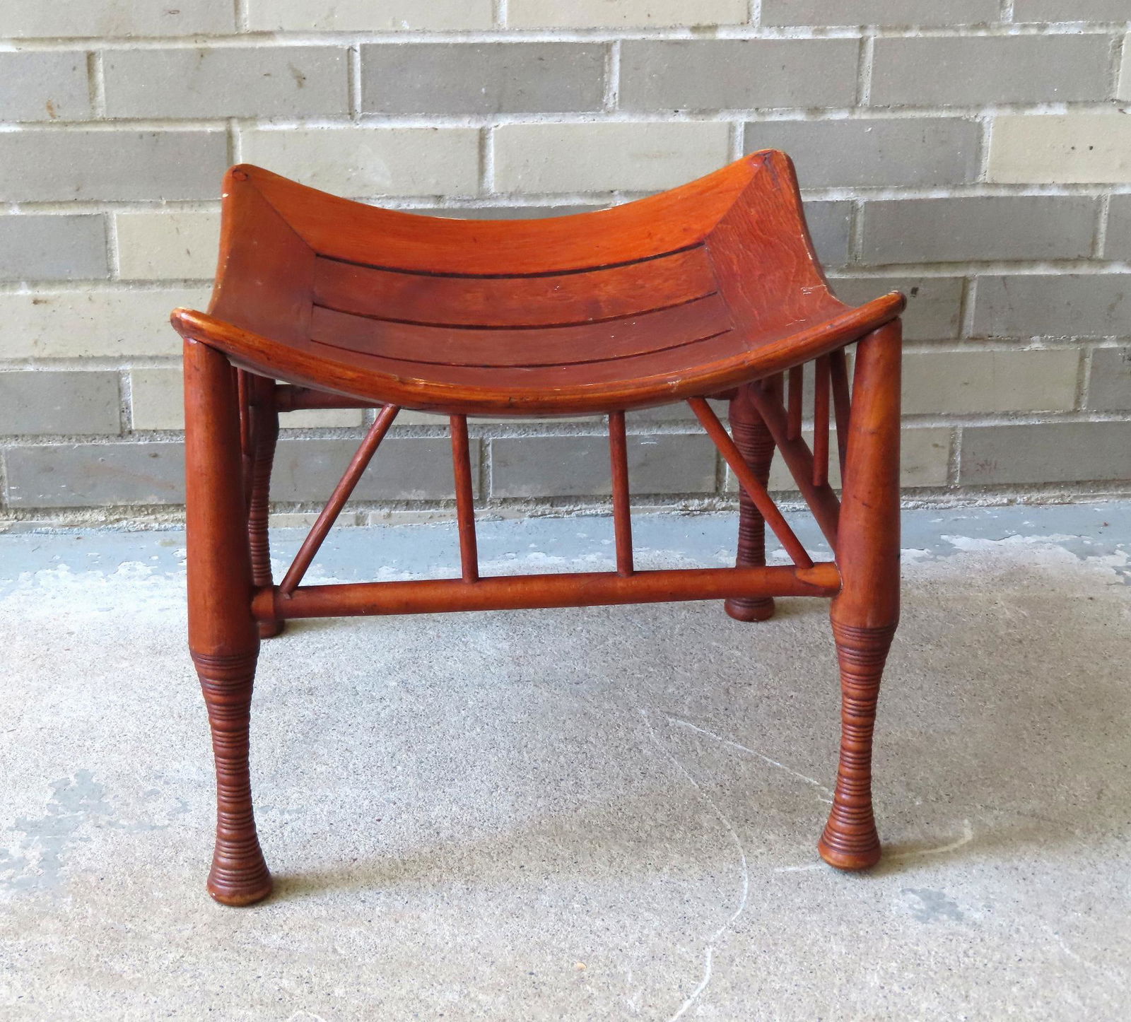 An aesthetics movement Thebes stool, early 20th century. Use wear, small hairline on one foot, (1 of 6)