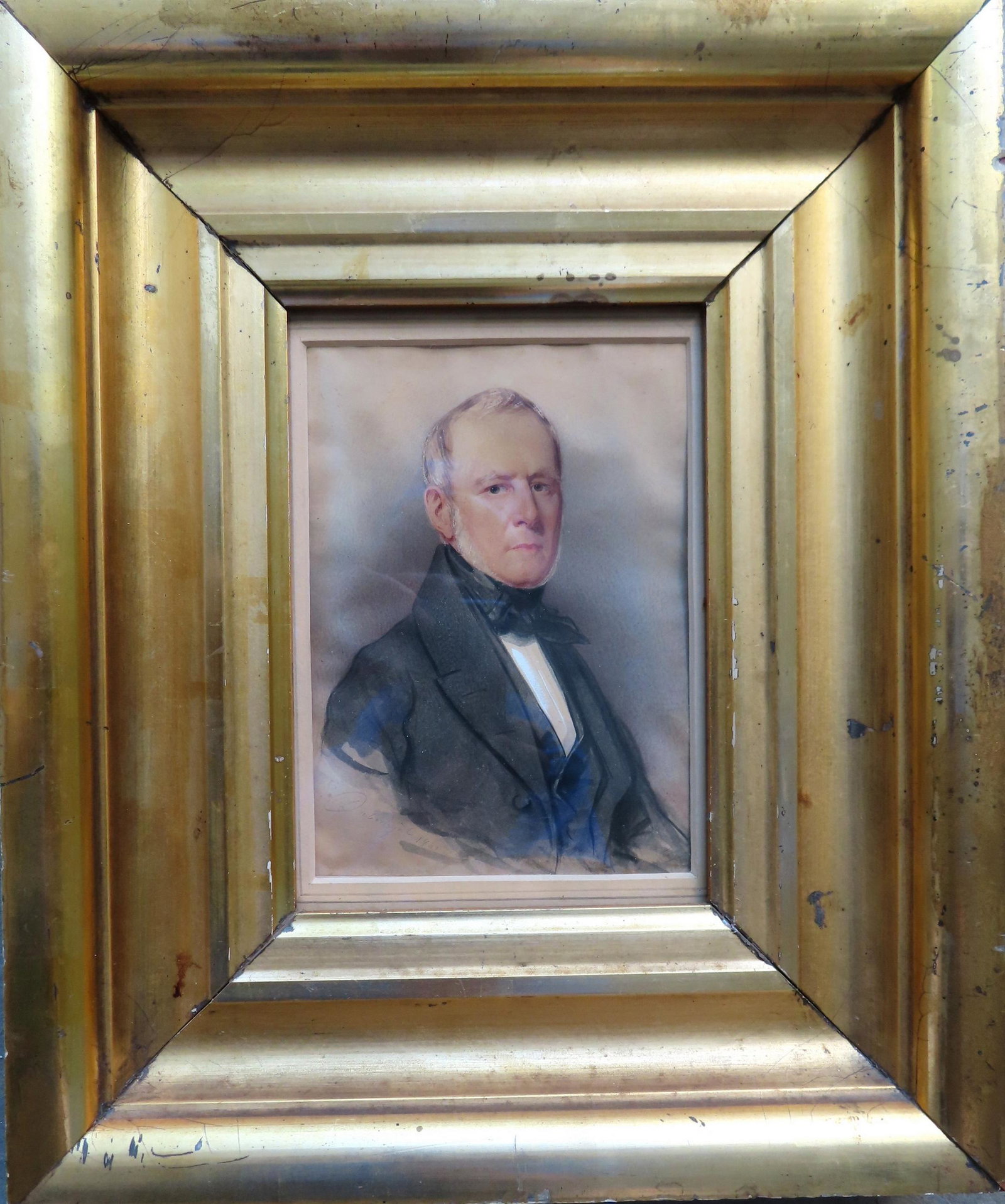 An early W/C portrait of a gentleman, circa 1850. Housed in a lemon gold frame of the same period.: An early W/C portrait of a gentleman, circa 1850. Housed in a lemon gold frame of the same period. The frame opening measures 6 3/8" x 8 5/8" and total frame size 11" x 13".