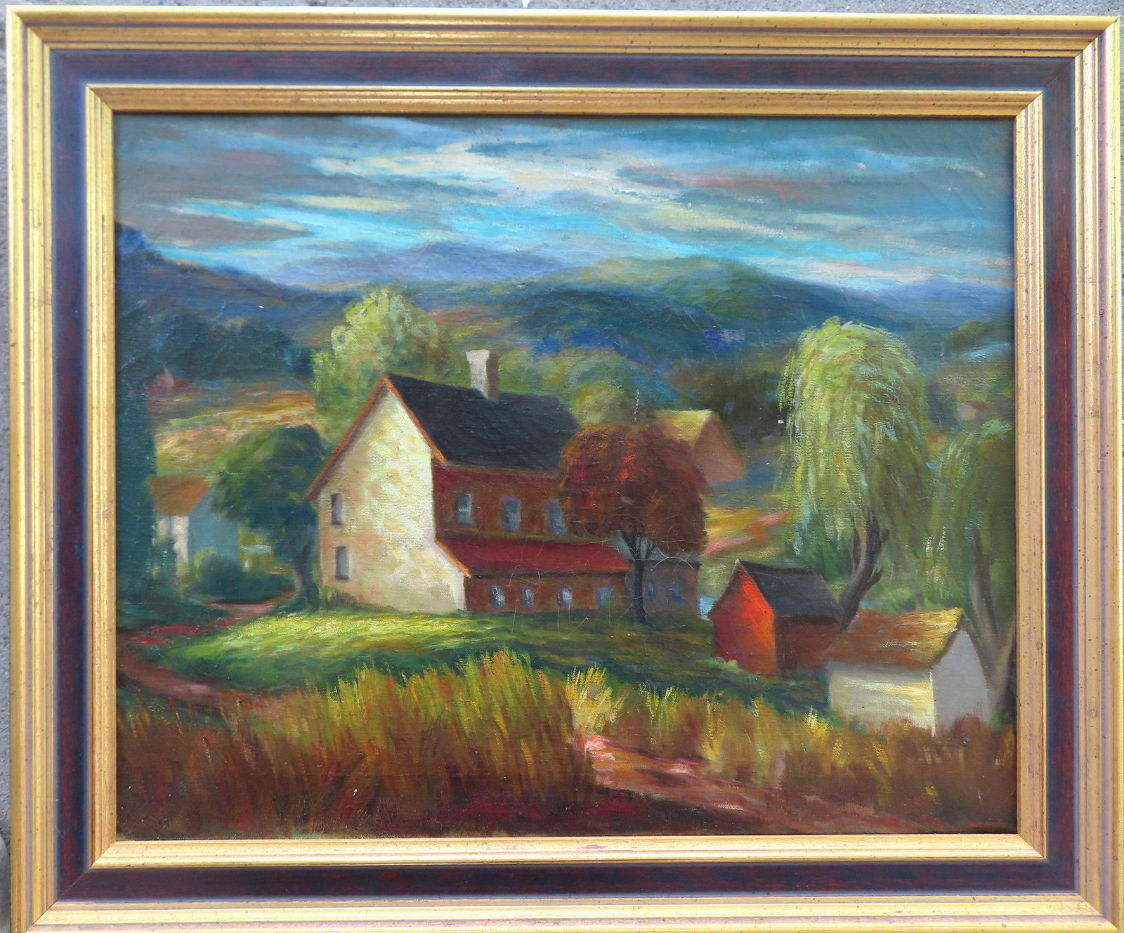 O/C Landscape depicting farmhouse and outbuildings at base of rolling hills, early to mid 20th: O/C Landscape depicting farmhouse and outbuildings at base of rolling hills, early to mid 20th century. Total frame size 19 1/2" x 23 1/2". Slight crazing, else very good condition.