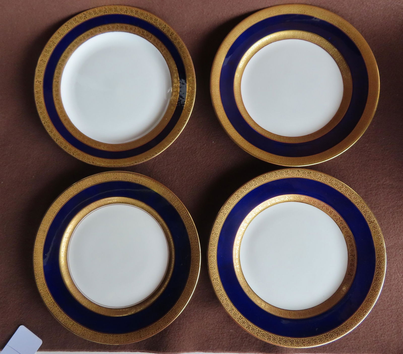 Grouping of fine china in cobalt blue and gilt, including: 10 soup bowls signed "Mintons / Tiffany & (1 of 12)