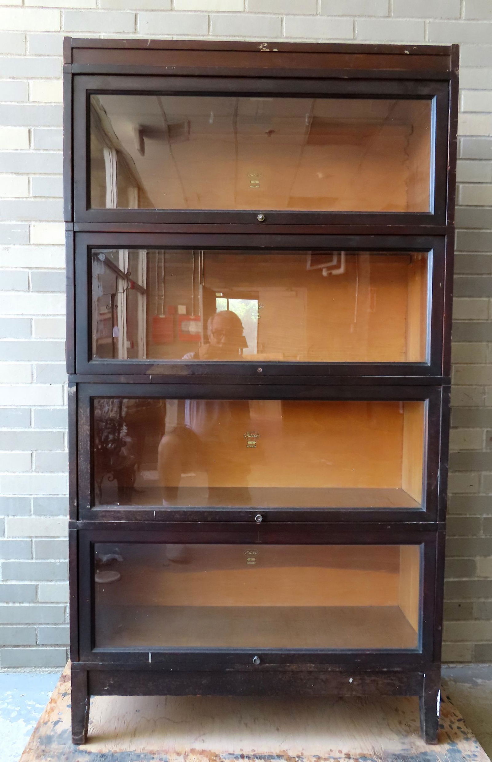 A "Macey 711" mahogany 4 section stacking bookcase - complete but missing 2 door pulls, some surface (1 of 7)