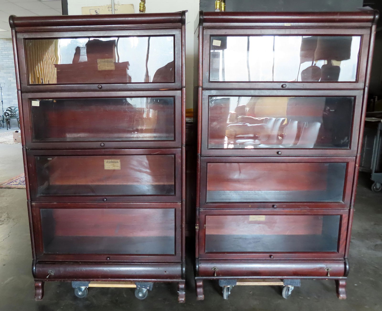 Two Lundstrom mahogany 4 section stacking bookcases, both complete with lower drawers - one bookcase (1 of 16)