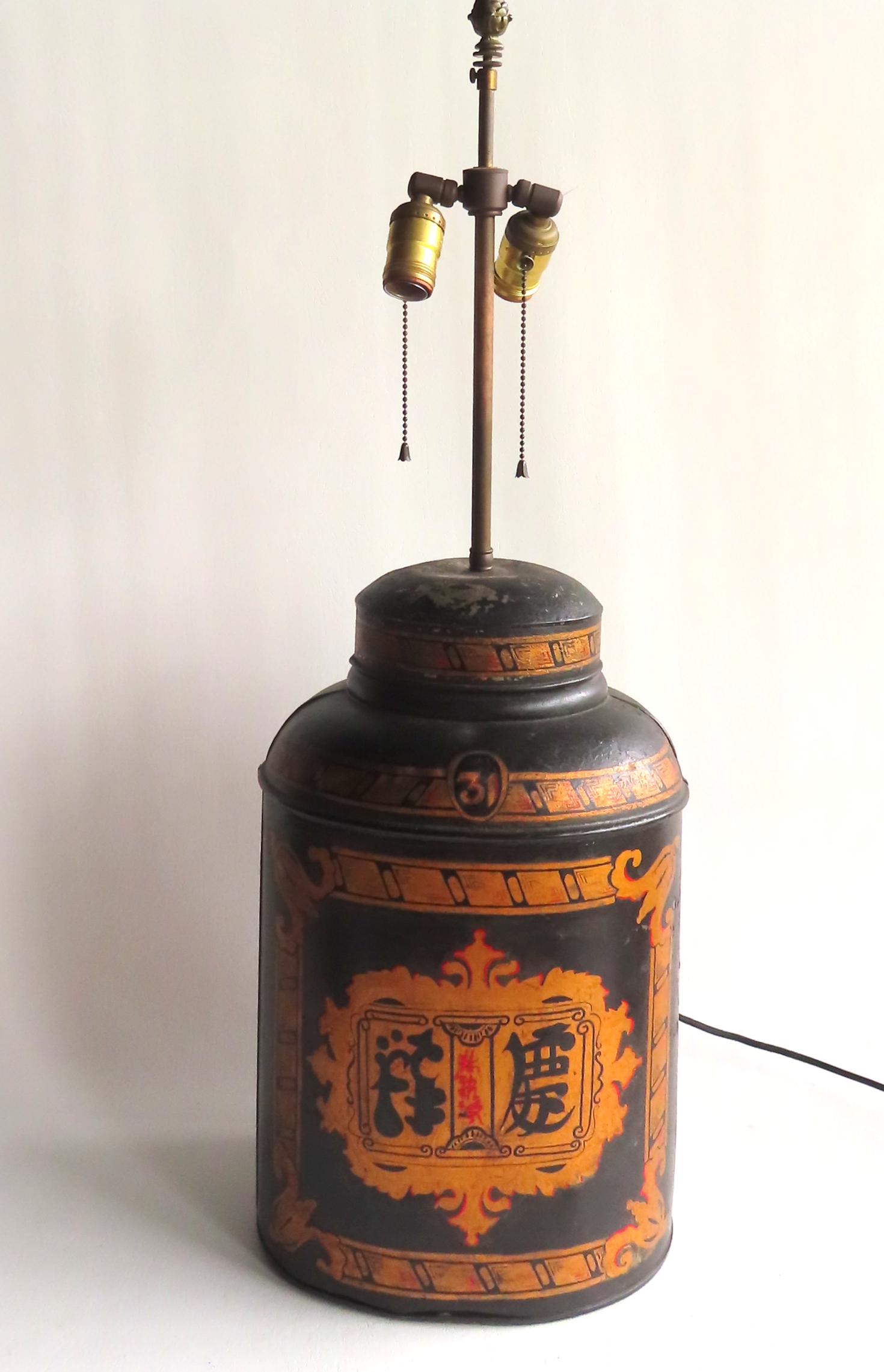 A toleware oriental tea canister converted to lamp, 19th century. Some repaint and touchup, (1 of 4)