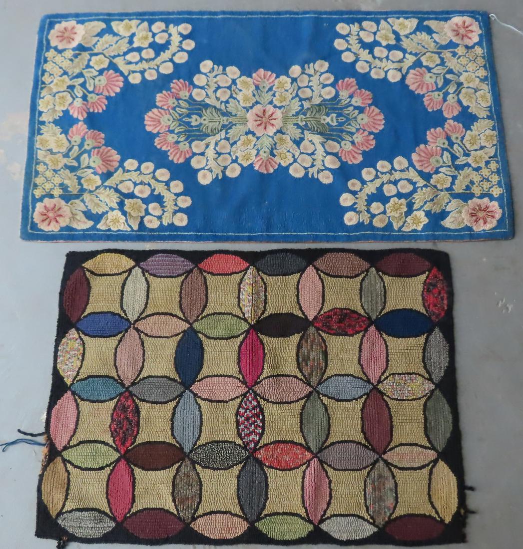 Two floral hooked rugs. The first with floral sprays in corners and a large grouping of flowers as a (1 of 10)