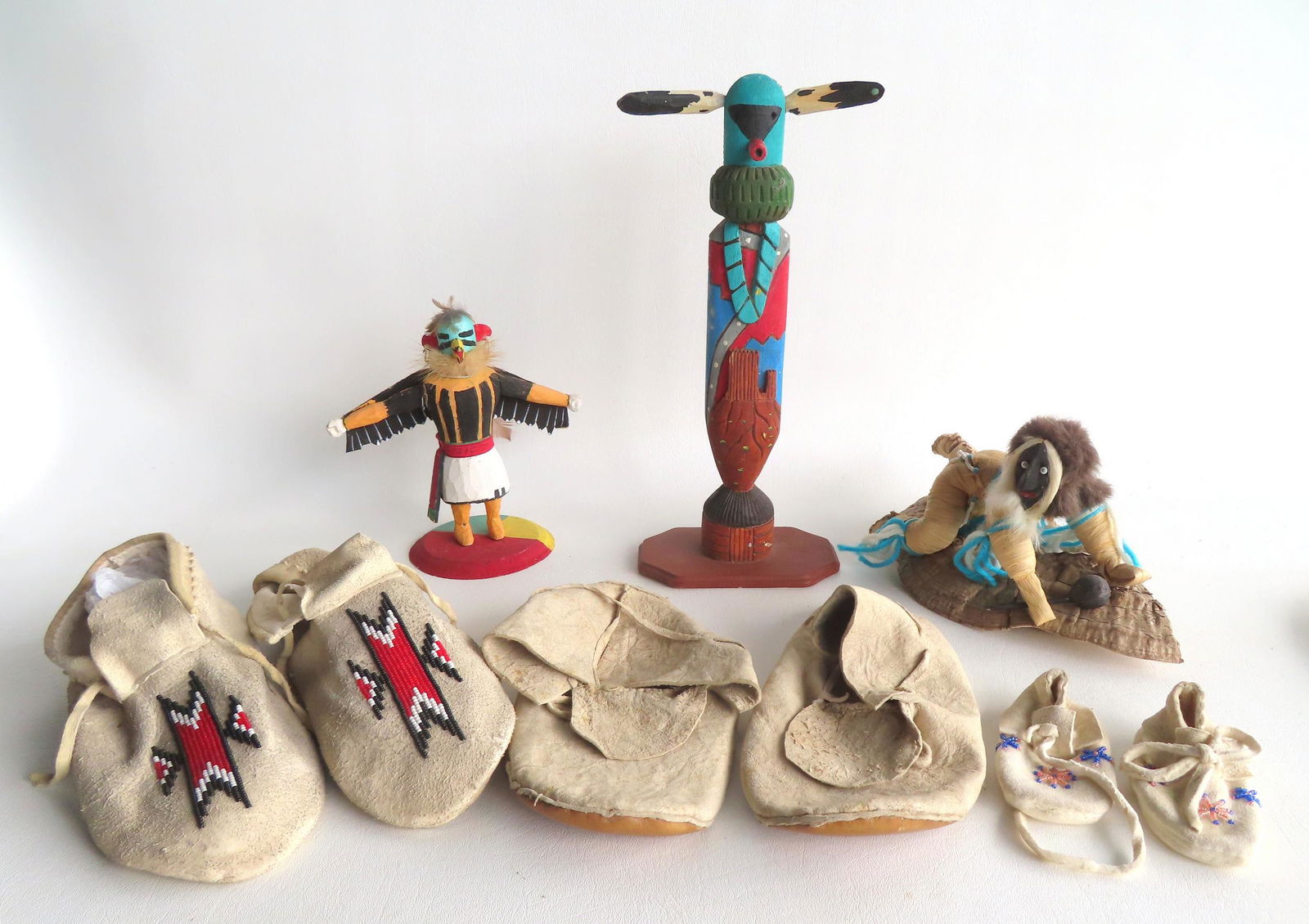 Grouping of Native American collectibles including: 3 pair of slippers, and 3 Kachina dolls, all mid (1 of 7)
