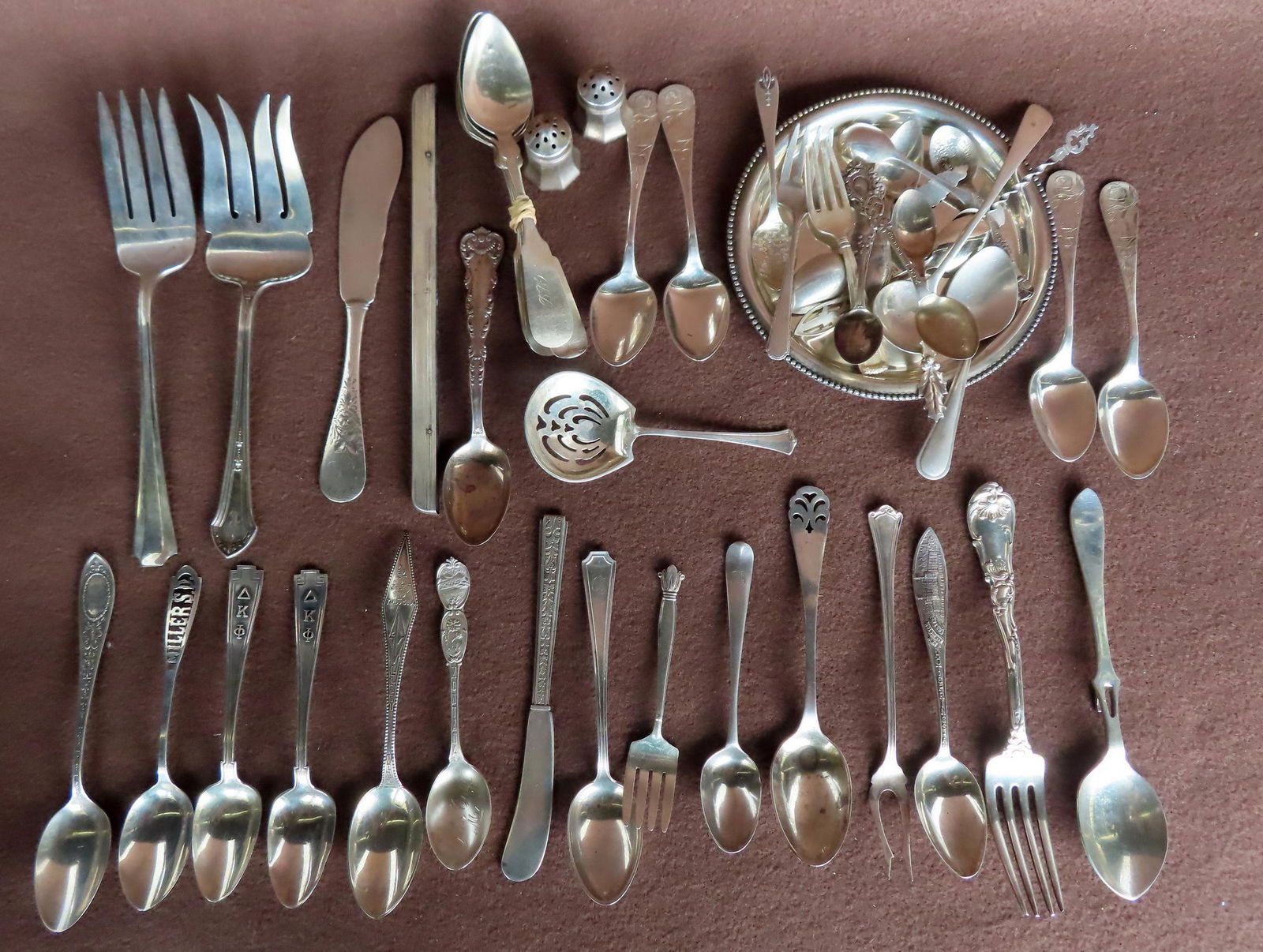 Grouping of sterling silver flatware, serving pieces and a small dish, most in good condition - (1 of 11)