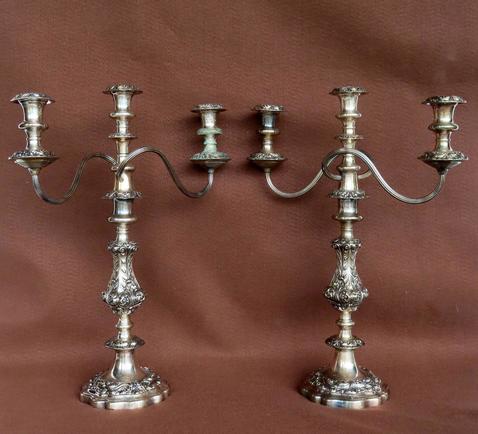 A pair of Gorham classical style silver plated candlesticks, each with 3 lights. Engraved on base (1 of 13)