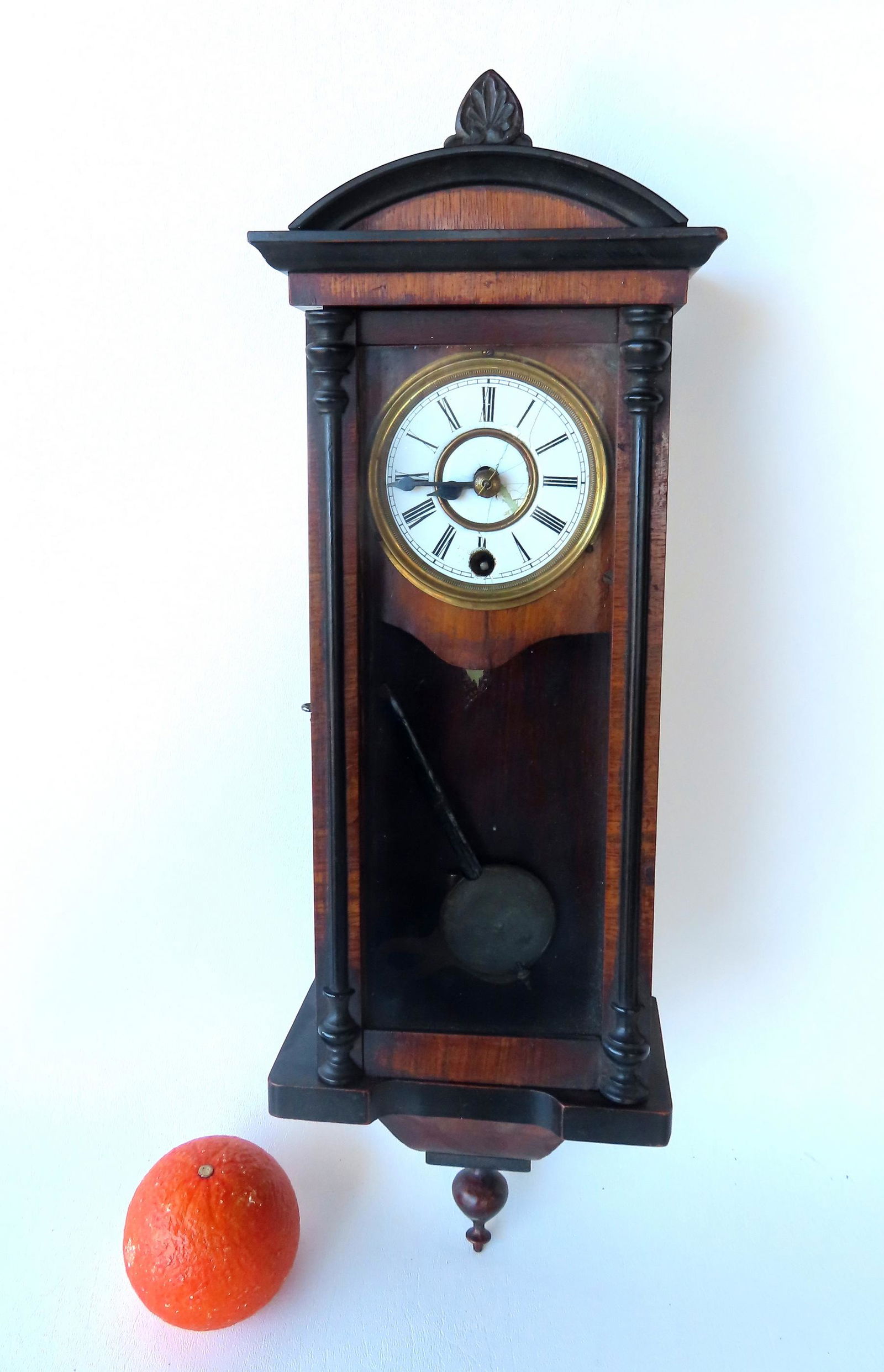 A diminutive black walnut wall clock in Renaissance Revival style (1 of 8)
