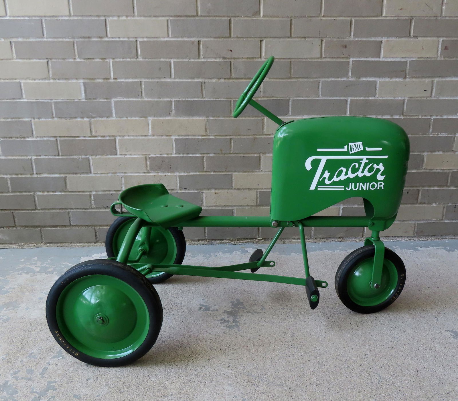 Peddle tractor signed "BMC Tractor Junior" (1 of 5)