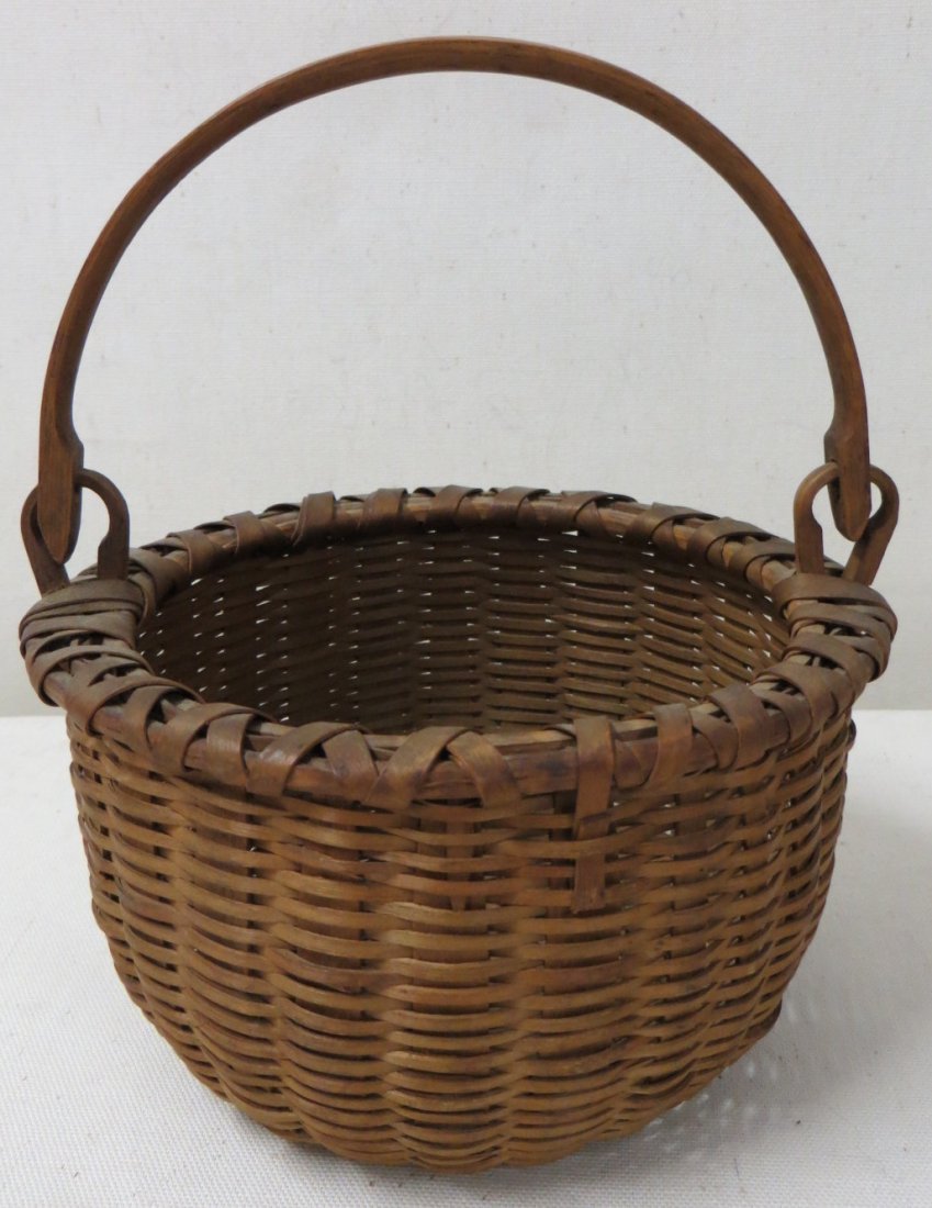 Miniature Taconic swing-handle basket, beautiful ol: Miniature Taconic swing-handle basket, beautiful old patina, 19th century, pushed in bottom. 6"D x 3.5"H.