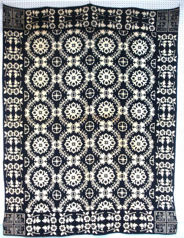 Blue/white floral coverlet signed Ruth Halls 1835: Blue/white floral coverlet signed Ruth Halls 1835 in all 4 corners. 8' x 6' 3". Estate of John Whiteford, Wassaic NY.