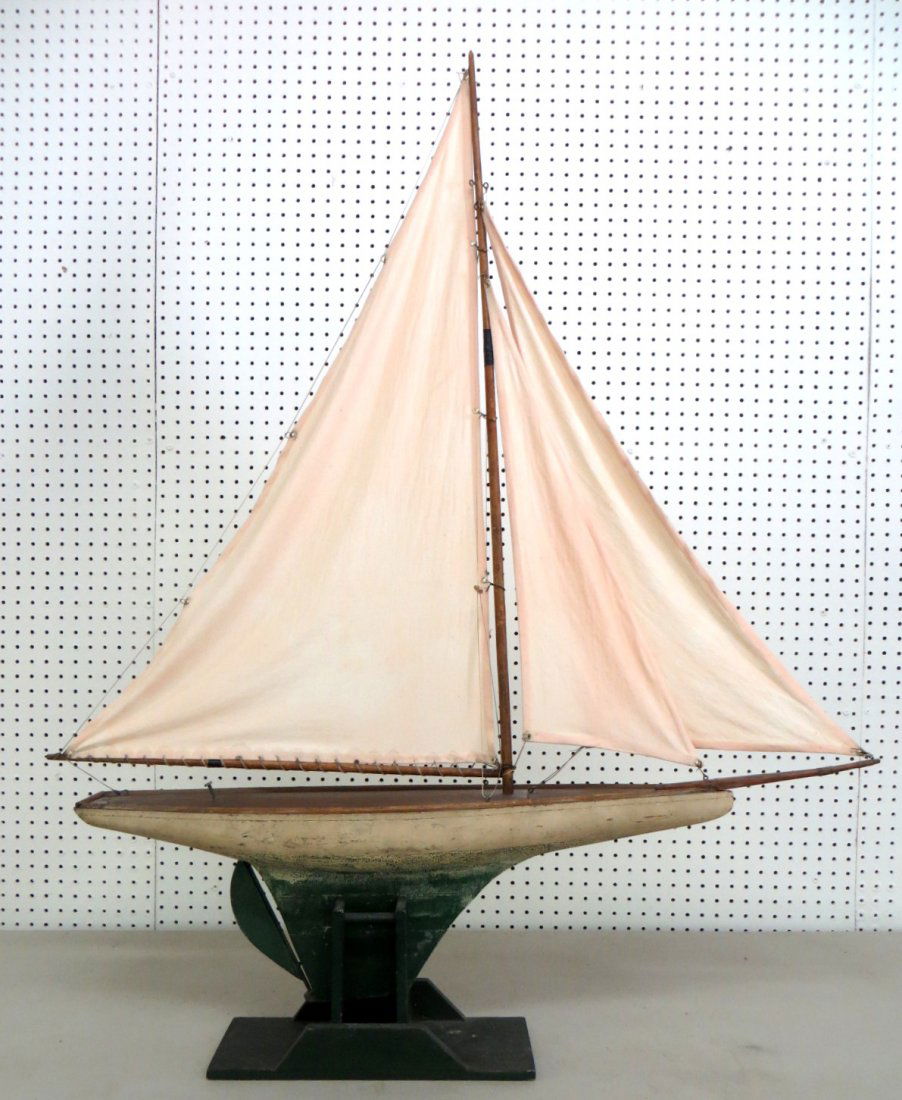 Pond sail boat in old green/white paint. 32": Pond sail boat in old green/white paint. 32"L of hull - 37.5" sail height from top of deck. Fully rigged and ready to sail. Provenance: From a private Hyde Park collector.