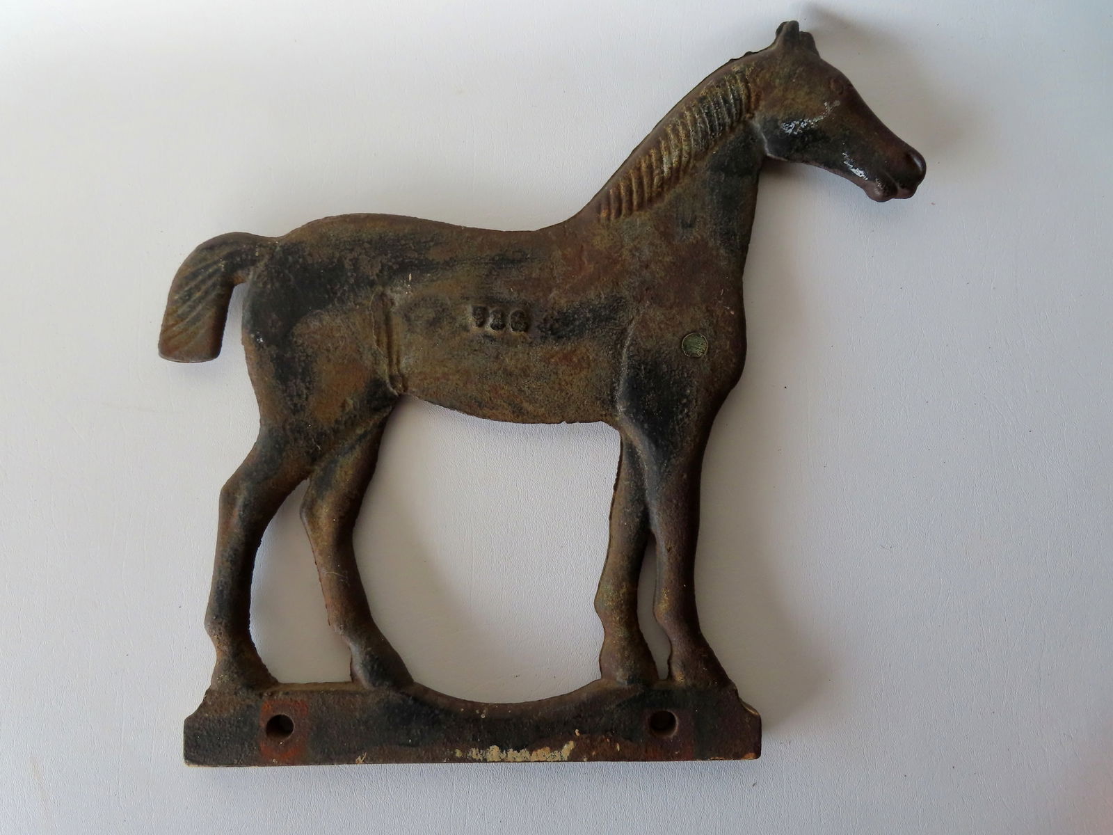 A Dempster horse-shaped cast iron windmill weight, late 19th to early 20th century. Marked 58C or (1 of 5)