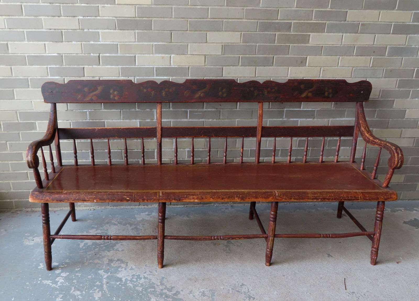 A stenciled and hand painted bench decorated with birds and berries across the top back splat and (1 of 14)