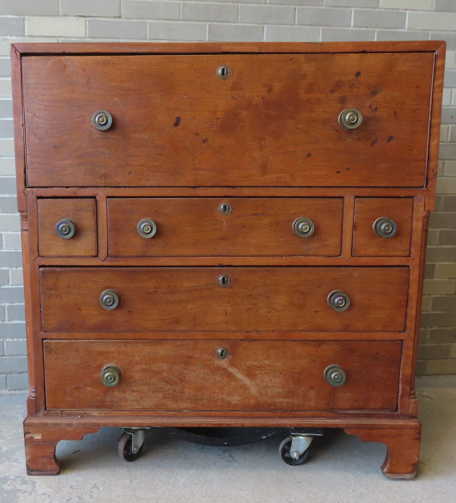 A Southern butternut butler's chest on bracket based having 1 large drawer/desk with fitted interior (1 of 18)