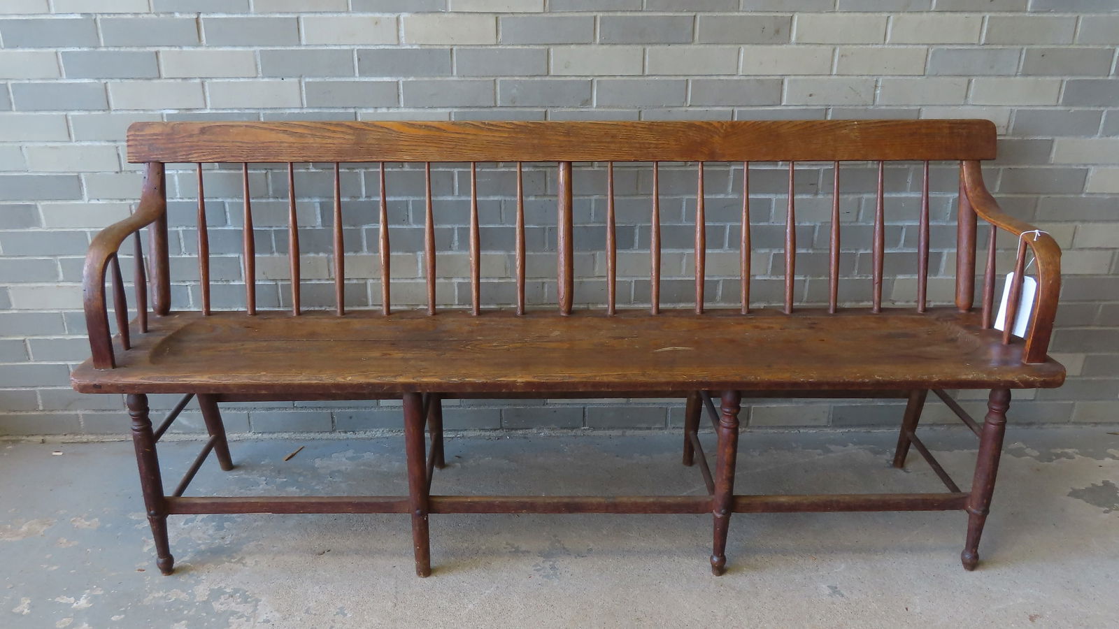 A school house spindle-back bench, various hard woods, with turned legs and cross stretchers, and (1 of 10)