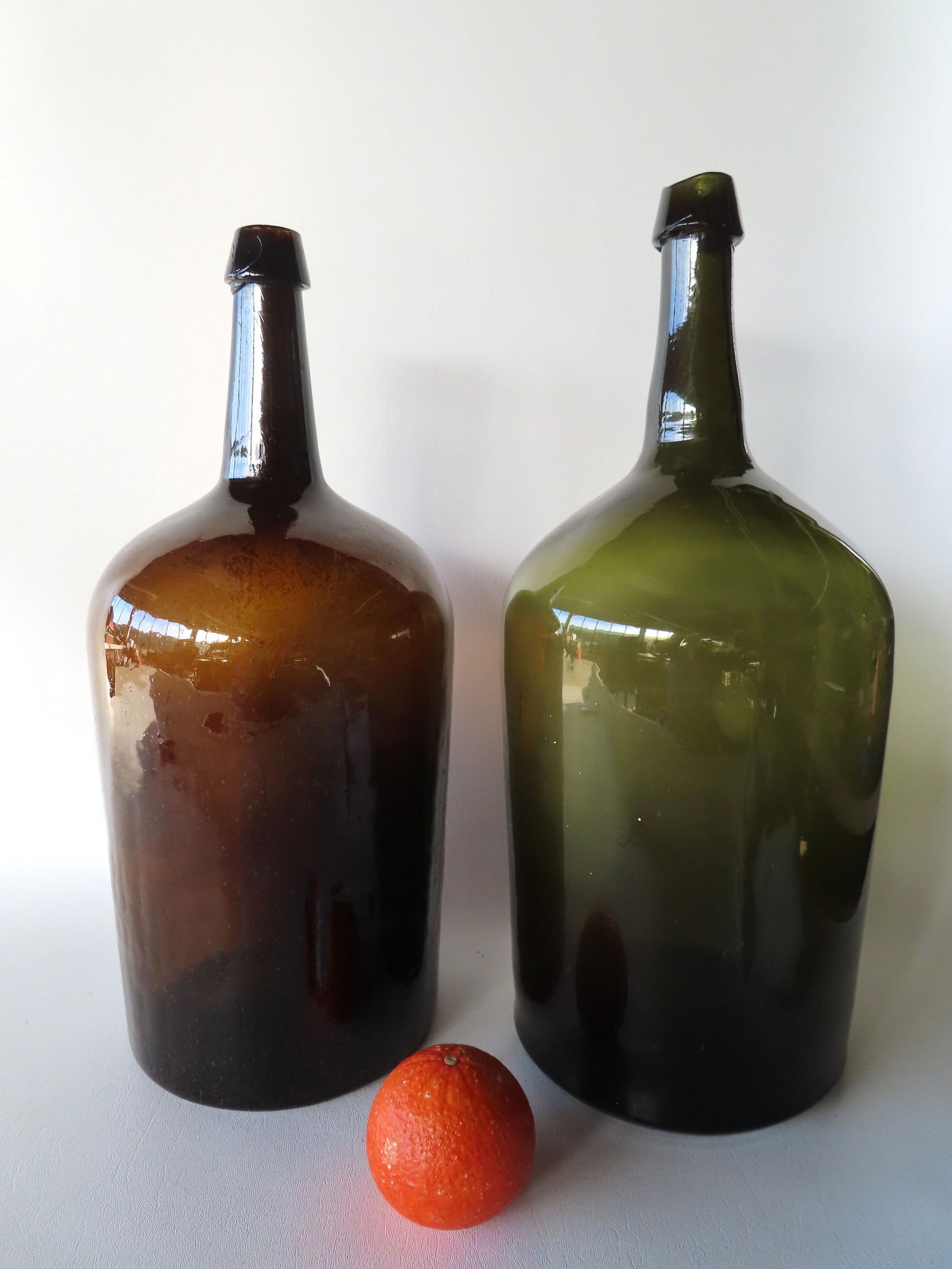 Two hand blown demijohn bottles with scarred pontils, probably mid 19th century, both in very fine (1 of 6)