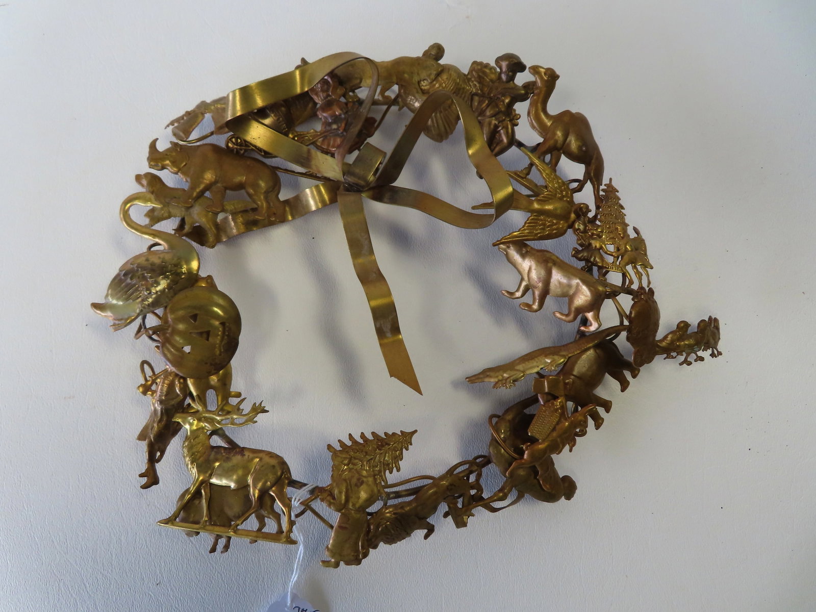 A Dresden brass all holiday wreath, circa 1980, very good condition. Measures 11" at widest point: A Dresden brass all holiday wreath, circa 1980, very good condition. Measures 11" at widest point
