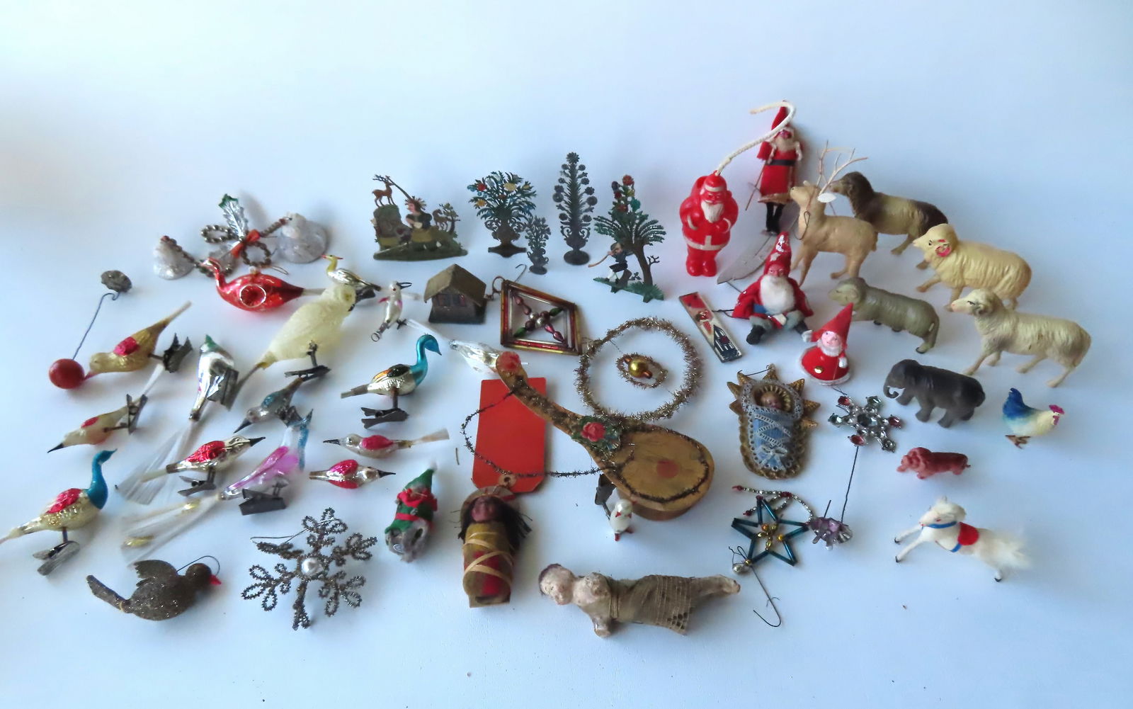 A grouping of vintage Christmas tree ornaments including: 15 glass birds, including a rare owl (1 of 17)